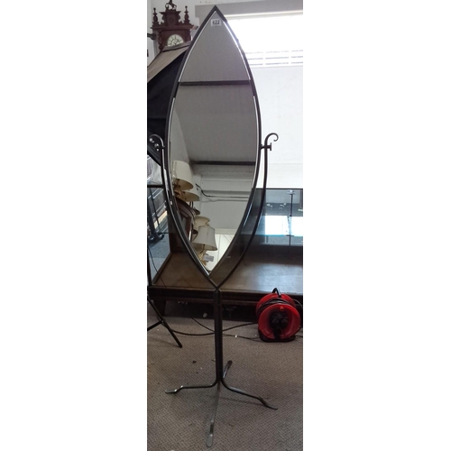 622 - Vintage free-standing cheval mirror with arched top and wrought iron frame on tripod base.