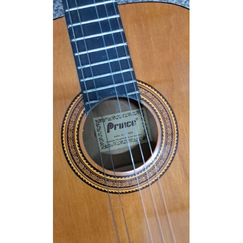 623 - Model No. 425 classical acoustic guitar. Handcrafted with selected materials, featuring a polished w... 