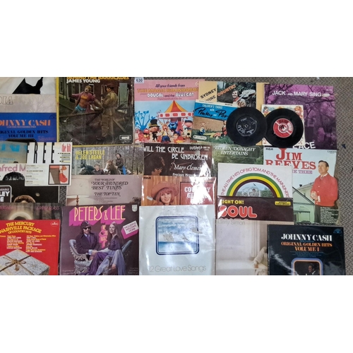 630 - Collection of 19 vinyl records and 2 singles, featuring artists such as Johnny Cash, Jim Reeves, and... 