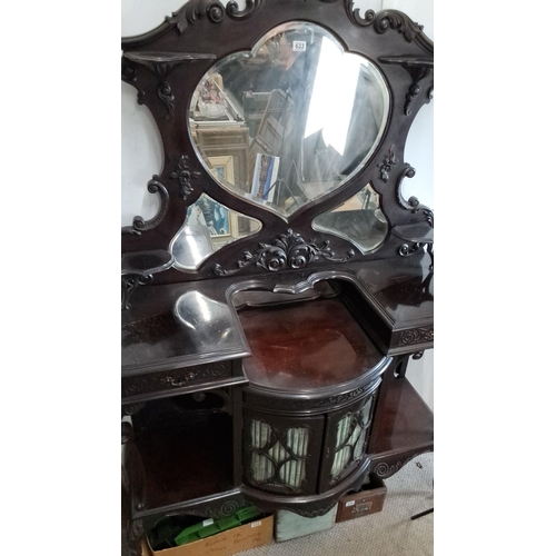 633 - Antique Victorian mahogany dresser with intricately carved details, featuring a heart-shaped mirror ... 