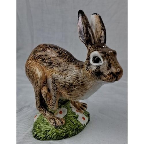 64 - John Beswick ceramic hare figurine, hand-painted with exquisite details. The hare is standing on a g... 