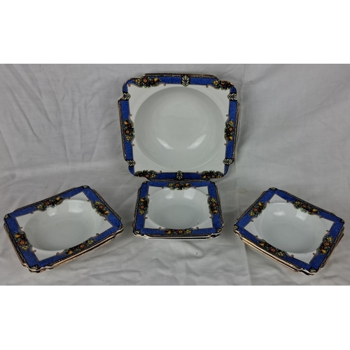 78 - Set of 7 square porcelain bowls with blue floral and fruit border design.