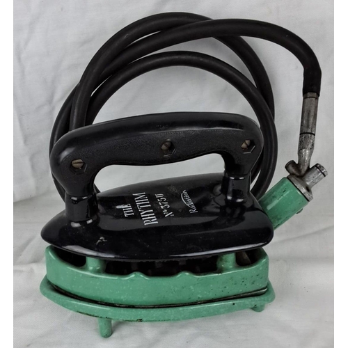 92 - Vintage electric iron, The Rhythm No. 375U by Radiator. It features a black handle and green base. T... 