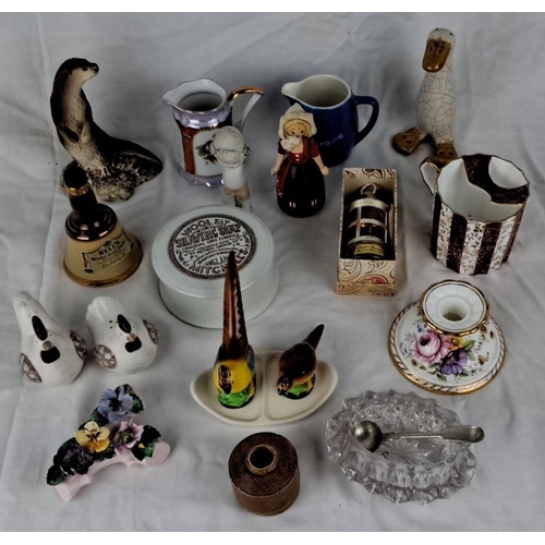 94 - Mixed lot of items including ceramic figurines, mini pitchers, candle holders, a Bell's Scotch Whisk... 