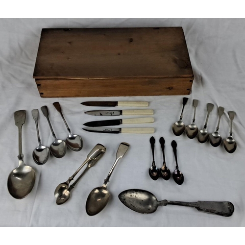 97 - Includes various spoons and knives, some with silver handles and intricate designs. Accompanied by a... 