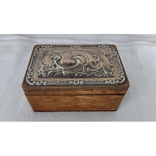 1185 - 19th-century decorative oak box with fully hall marked repoussé lid. Lush interior lining. A fine ex... 