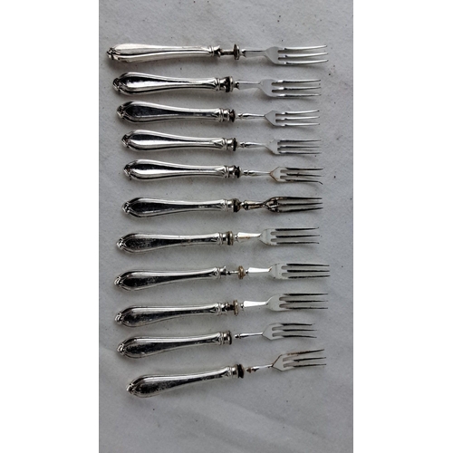 1191 - Set of twelve sterling silver dessert forks with decorative handles, likely from the early to mid-20... 