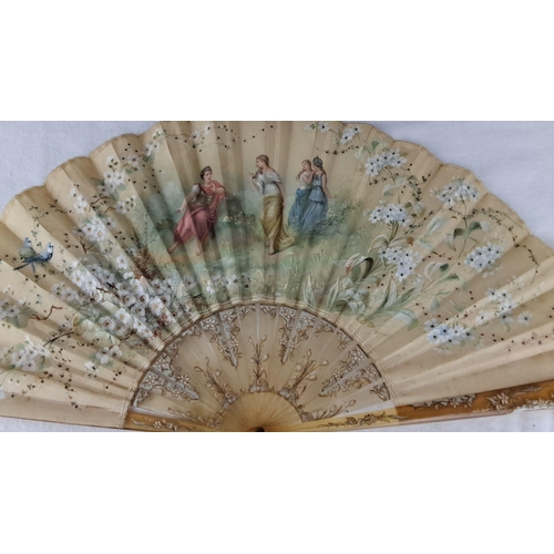 1192 - Hand-painted folding fan with floral and figure motifs. Delicate lace trim and accompanied by a blac... 