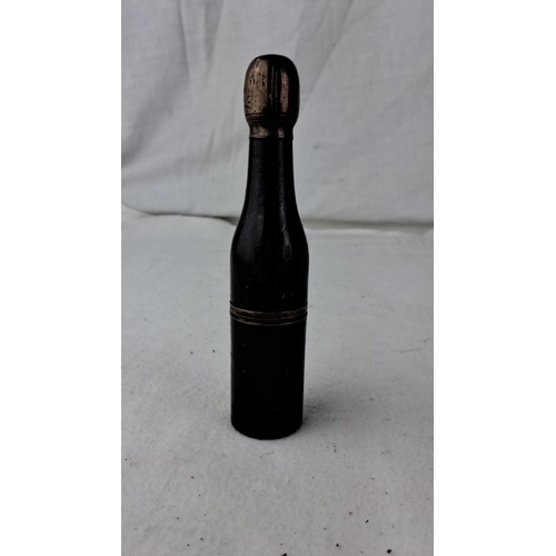 1200 - An antique metamorphic novelty pipe, in the form of a champagne bottle. Early 20th century, featurin... 