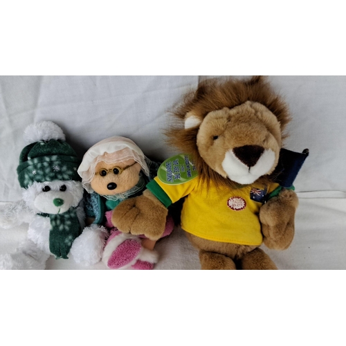 1205 - Set of three plush toys, featuring a bear with hat and scarf, a bear with glasses and bonnet, and a ... 