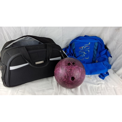 1211 - Columbia 300 bowling ball with matching black Revelation carrying bag and blue backpack. Bowling bal... 