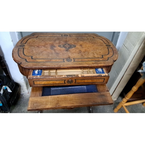 1216 - 19th-century Victorian sewing table, crafted in walnut with intricate marquetry inlay. Features orna... 