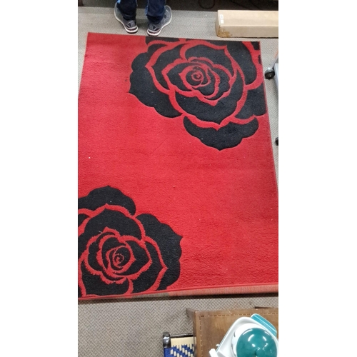 1219 - Hand Carved Rose Rug, red with black rose design. Approximately 133cm x 190cm, made of 100% heatset ... 