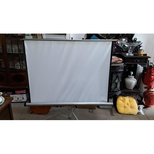 1220 - Portable projection screen with retractable stand. Comes with original packaging and extendable fram... 