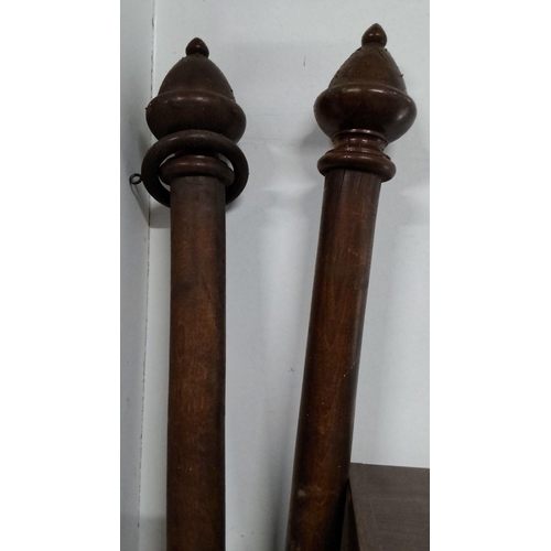 1229 - Pair of antique Georgian mahogany curtain poles, featuring classical turned finials.