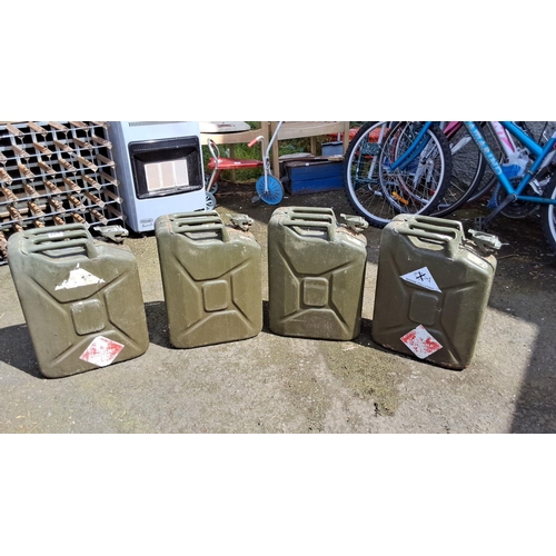 639 - Set of four vintage British military metal jerry cans. Olive green colour with hazard labels. Featur... 