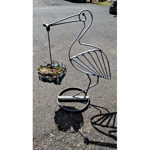 646 - wrought iron planter stand in the shape of a heron, with a hanging basket feature.