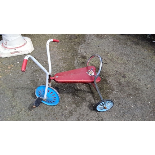 652 - Vintage tricycle featuring a red steel frame with blue wheels and white handlebars. Includes retro g... 