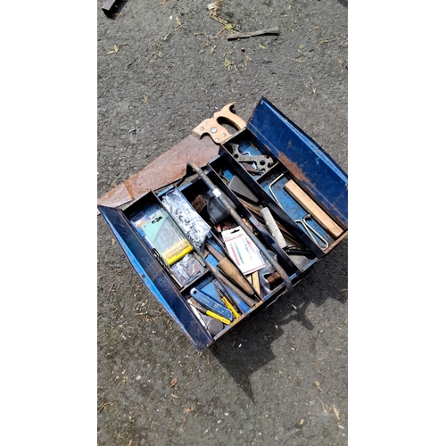 653 - Vintage metal toolbox containing assorted hand tools and accessories. These include a handsaw, vario... 