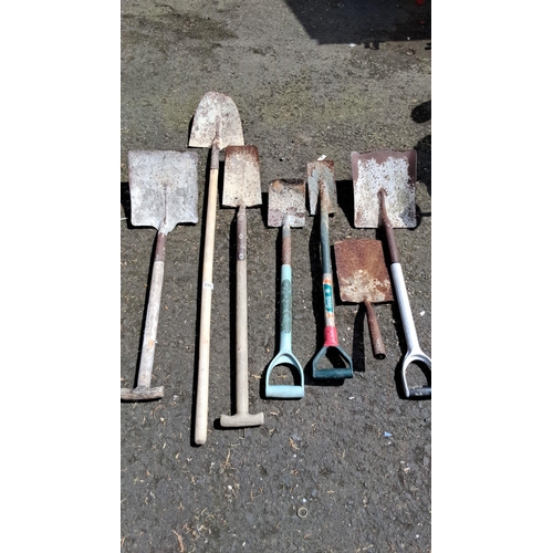 662 - Collection of seven assorted garden spades and shovels featuring wooden and metal handles.