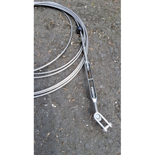 673 - Stainless steel wire rope with swage fork end fitting. Measures approximately 3 meters in length.