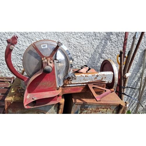 687 - Vintage Red Industrial Bacon slicer Saw. Features durable cast iron construction and a large circula... 