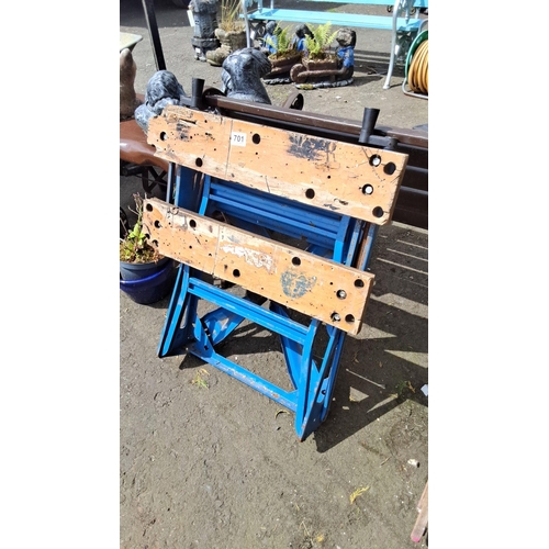 701 - Folding woodwork bench with metal frame and wooden clamping surface.