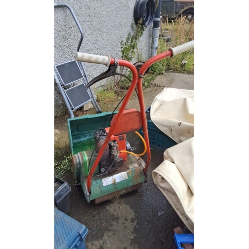 709 - Qualcast Suffolk Punch 35 DL petrol lawn mower.