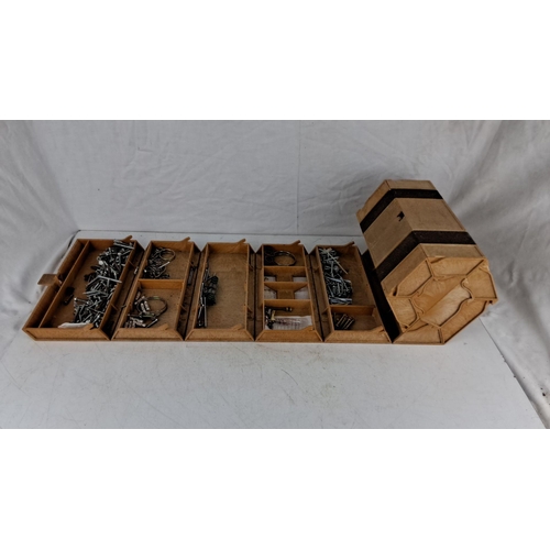 714 - Hexagonal Rolykit hardware organizer with multiple trays, containing assorted nails, screws, and met... 