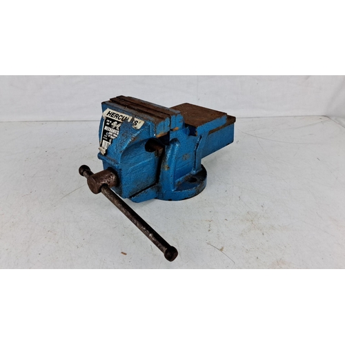 718 - Vintage Hercules Mechanics Bench Vise, heavy-duty metal construction, with rotating base and large a... 