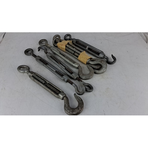 722 - Set of Robur six galvanized steel turnbuckles with adjustable eye and hook ends.