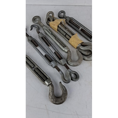 722 - Set of Robur six galvanized steel turnbuckles with adjustable eye and hook ends.