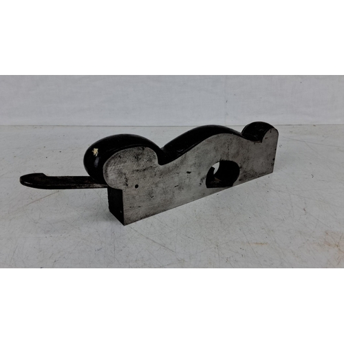 725 - Antique iron and wood woodworking molding plane with a distinctive curved body, likely from the 19th... 