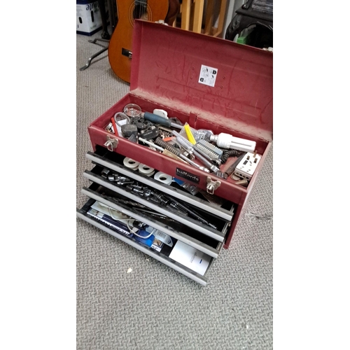 727 - Halfords Professional red metal tool chest with multiple drawers and assorted tools.