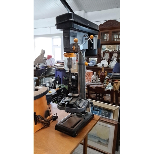 728 - Titan TTB541DBT 700W Drill Press. Features a 240V motor with variable speed settings and an 81mm dri... 