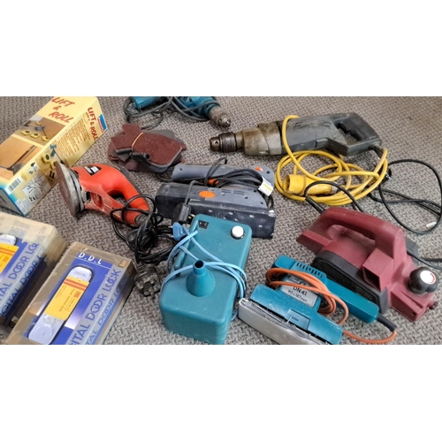 731 - Mixed lot of various power tools and accessories. The lot includes digital door locks, drills, sande... 