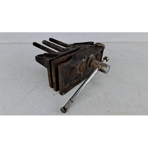 735 - Vintage metal woodworking vise with screw mechanism and clamping plates. Features rugged and durable... 