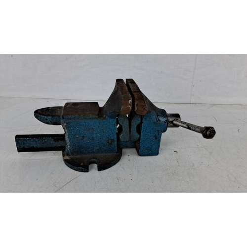 736 - Vintage cast iron bench vise with blue paint finish, approximately 10 inches in length. Heavy-duty c... 