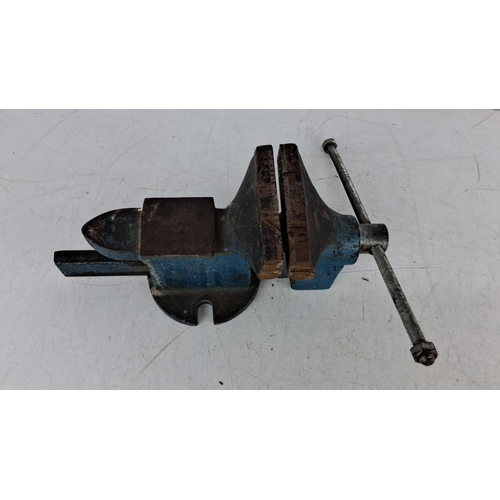 736 - Vintage cast iron bench vise with blue paint finish, approximately 10 inches in length. Heavy-duty c... 