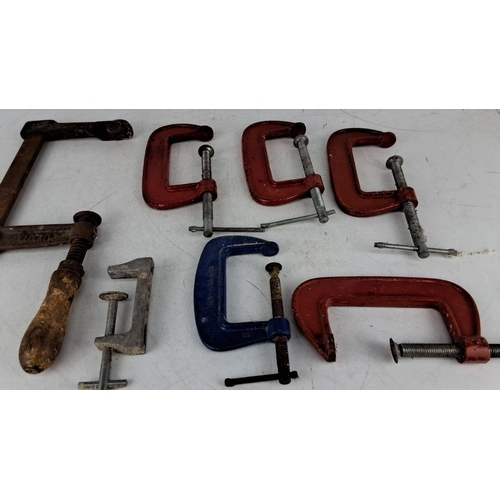 738 - Assortment of seven vintage C-clamps in various sizes and colors. Includes metal and wood handles. S... 