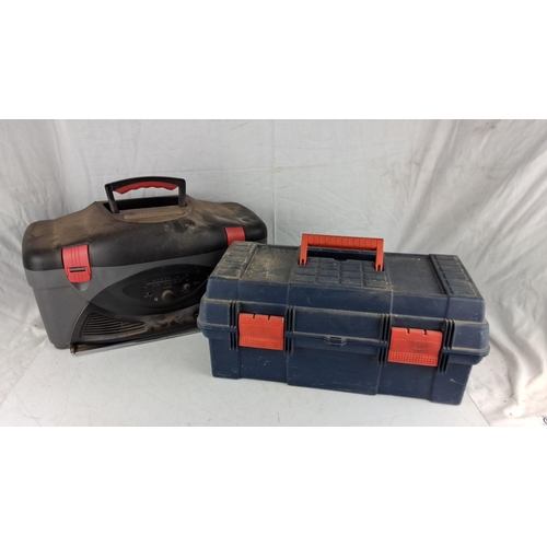 750 - Set of two items: A portable toolbox radio with a casing of red and black, including AM-FM tuner and... 