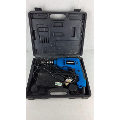 757 - Powerbase electric drill in a black plastic case. Includes Laser tool accessory and drill bits.