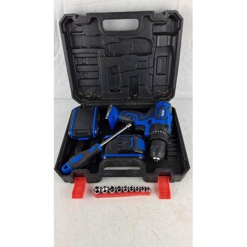 759 - Cordless drill kit, 21V. Includes battery, screwdriver, 7 socket bits, and case. Model 21C29REL.