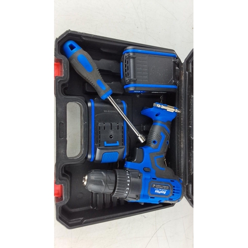 759 - Cordless drill kit, 21V. Includes battery, screwdriver, 7 socket bits, and case. Model 21C29REL.