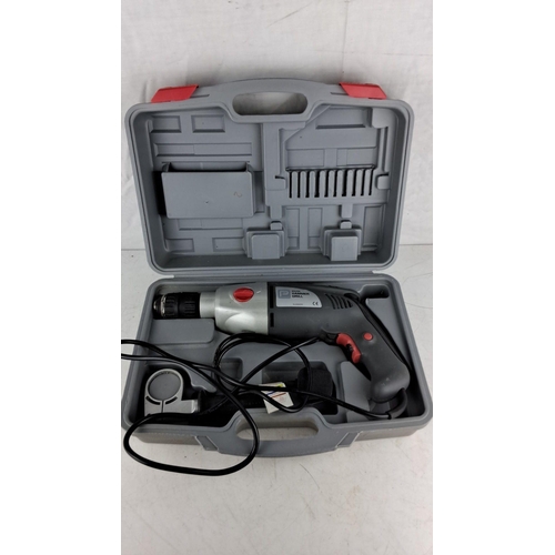 760 - Electric Hammer Drill set including carrying case and accessories. Brand: Parkside, Model: B2-50W. C... 