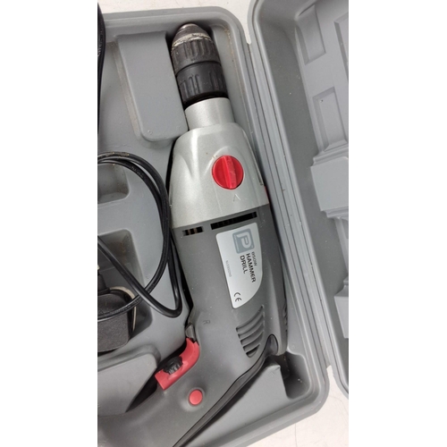 760 - Electric Hammer Drill set including carrying case and accessories. Brand: Parkside, Model: B2-50W. C... 