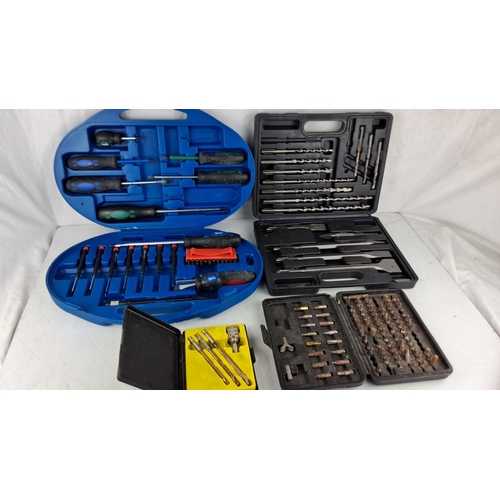 762 - Mixed lot of tool sets including screwdriver sets, drill bits, and chisel sets in branded carrying c... 