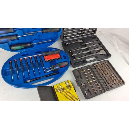 762 - Mixed lot of tool sets including screwdriver sets, drill bits, and chisel sets in branded carrying c... 