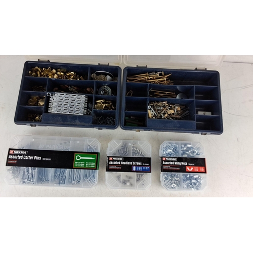 765 - Mixed lot of assorted hardware including two organizers with various screws and fasteners, and three... 