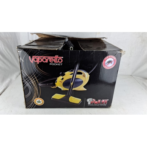 771 - Polti Vaporetto Pocket steam cleaner, boxed. Compact yellow design with multiple attachments.